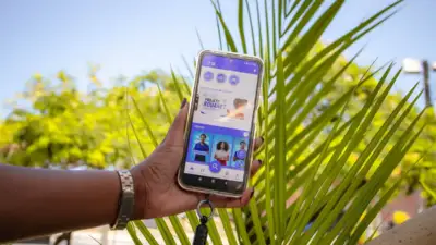 smartphone com aplicativo "ta na mão"